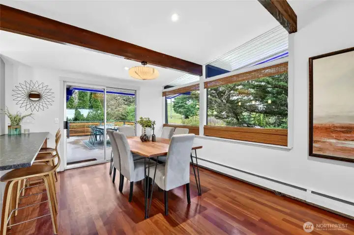 The dining room off the kitchen opens up to a spacious front deck.