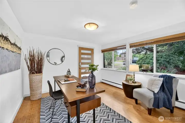 A dedicated office space is located off of the lower den & it even has it's own exterior door.