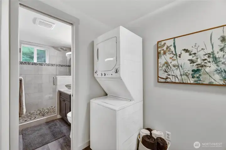Laundry right outside the bedroom for convenience.