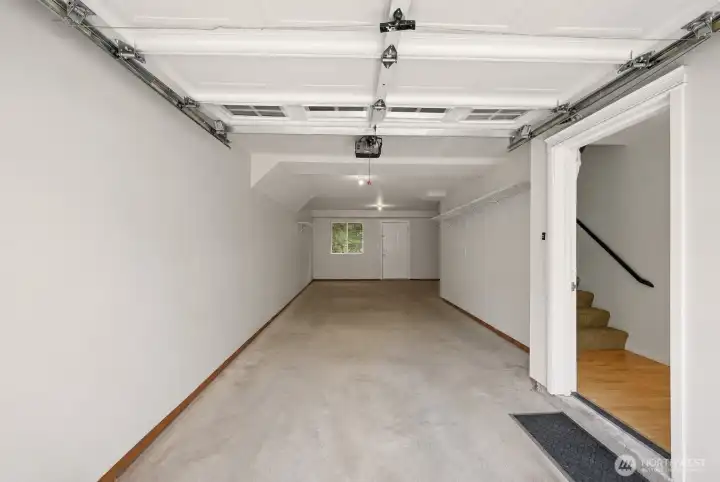 Tandem garage with access to patio outside.
