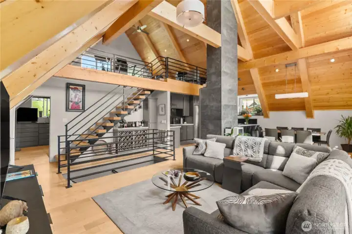 Living Room with Wine Bar under Open Wood & Steel Stairs Living Room with Wine Bar under Open Wood & Steel Stairs