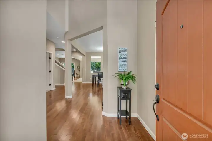 Soaring Ceilings and Engineered Hardwoods Create a Beautiful First Impression.