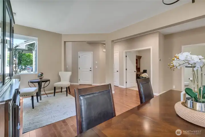 View Toward the Front Entry with Coat Closet and Main-Floor 5th Bedroom to the Right.