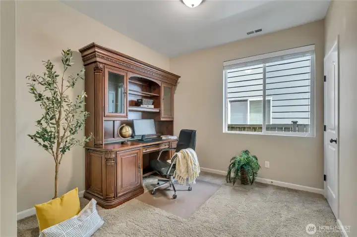 Main Floor Bedroom, Currently Used as an Office with Walk-In Closet to the Right.