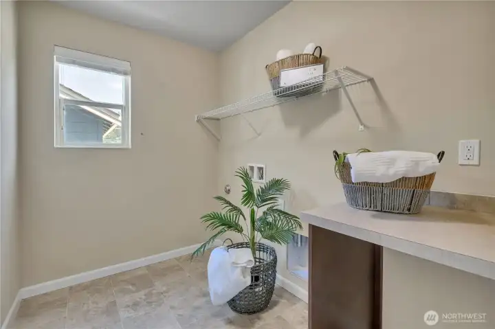 Convenient Upstairs Laundry Room Near All Bedrooms.