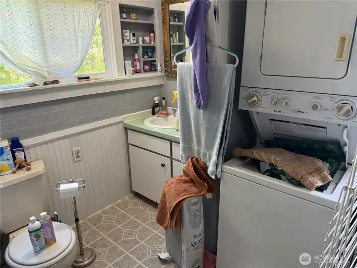 Full bathroom with laundry
