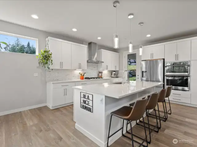 Home features an open main floor kitchen