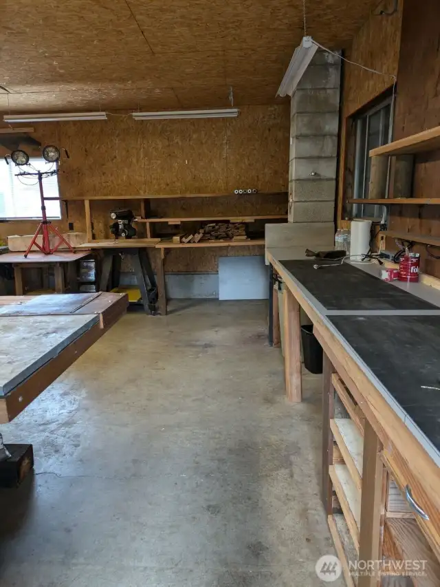 another view of workshop with benches