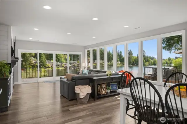 Meticulously renovated 3200sqft, 5BR/2.5BA, home offering walls of windows showcasing lake views and Mt Rainier.