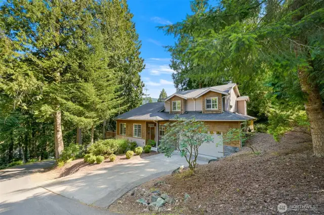 34 Sunflower Circle is on a corner lot surrounded by trees which affords privacy, no neighbors to either side