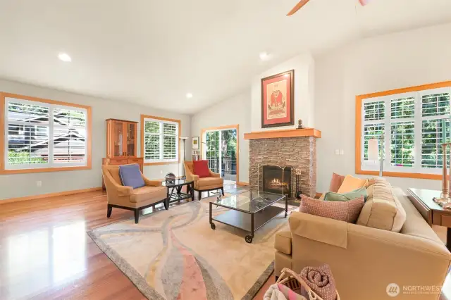 View in the living room towards the sliders to the main floor second story deck