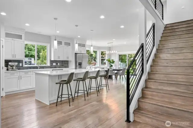 The kitchen is bright and open.  Entertaining is easy in this setting.