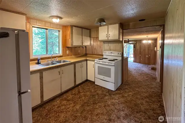 View through kitchen toward front of house