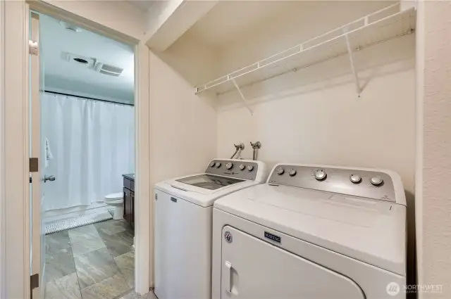 Laundry conveniently located in the upstairs hallway.