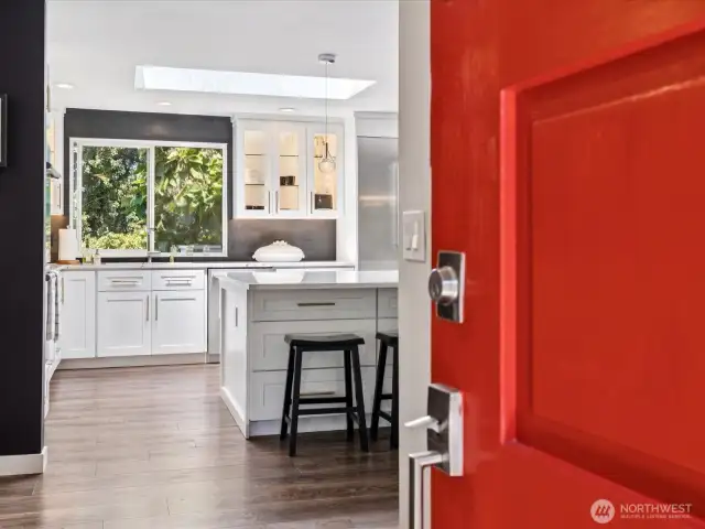 View from private front porch into entertainer's dream kitchen