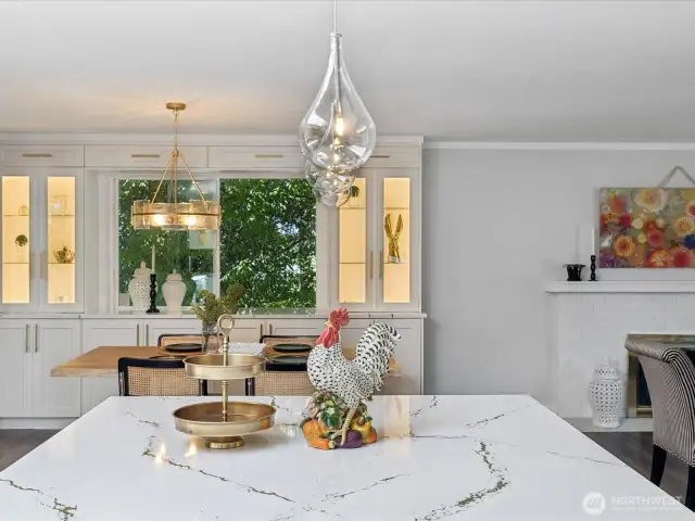 8'10" x 7'5" Cambria slab quartz kitchen & gorgeous pendant lights to enhance the natural light from the skylight
