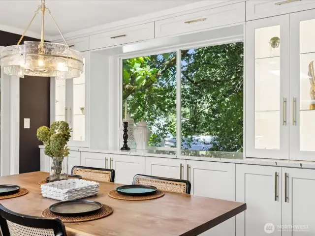 View  of built in cabinetry in dining space, flanking window