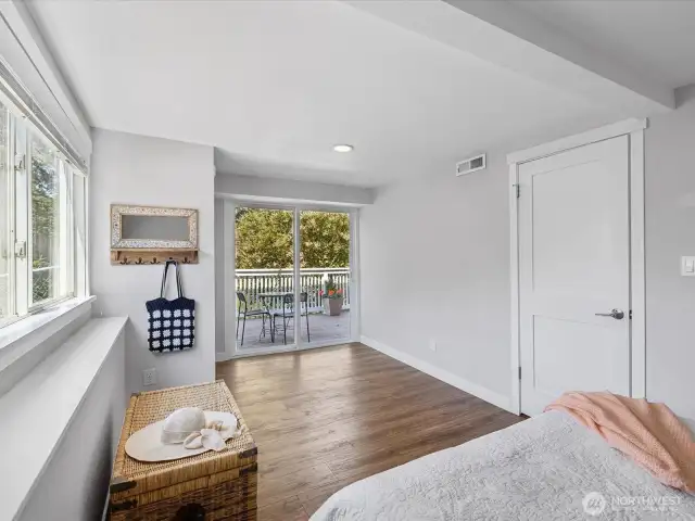 Bedroom #4 has a slider door that opens out onto lower deck, could be an excellent 2nd primary or a multigenerational suite