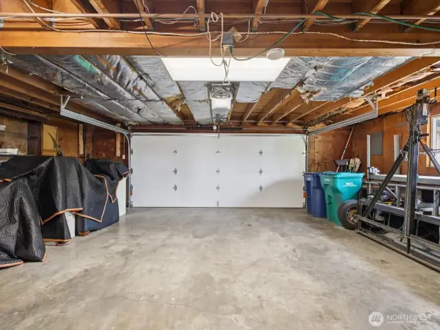 2 car garage with existing storage, & built-in Riccar vacuum