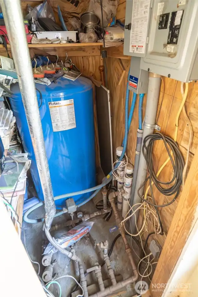 Pressure tank/electrical panel.