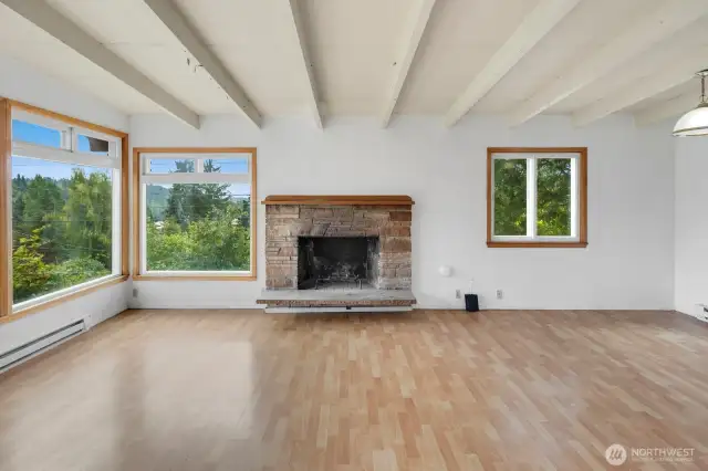 Spacious living room with dining nook on the far right edge.