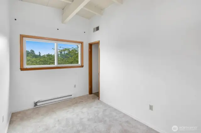 Main floor bedroom #3, facing the front of the home.