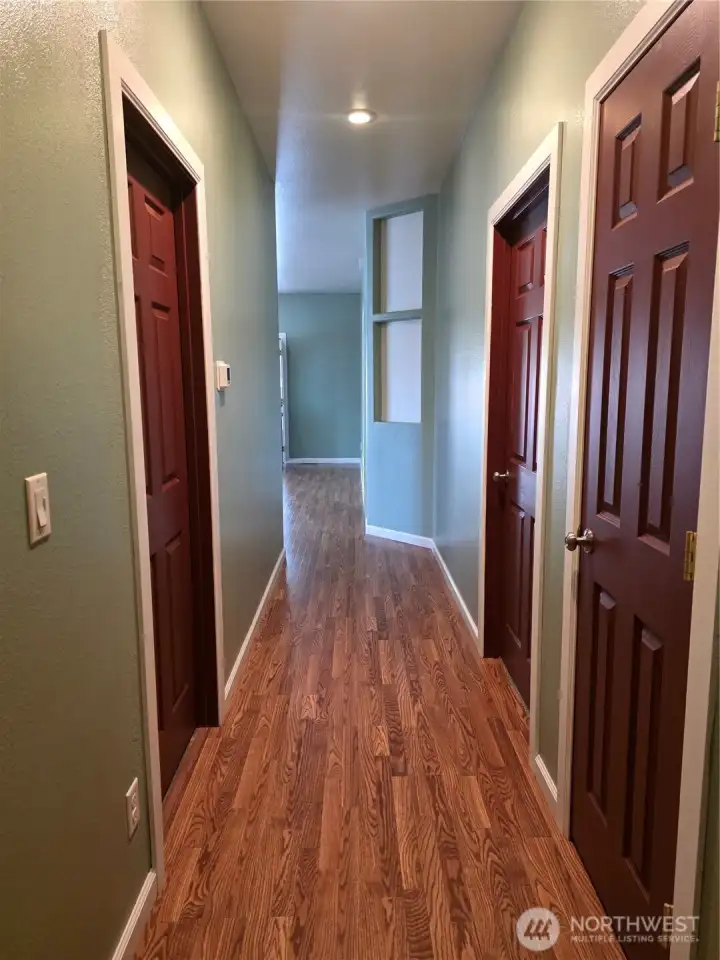 Hallway offset to keep shared social spaces separate from private personal spaces