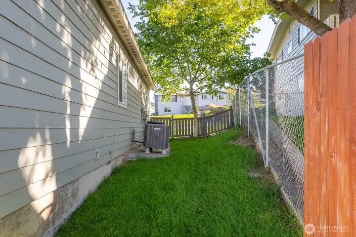 Gated access to Side Yard from the front yard.