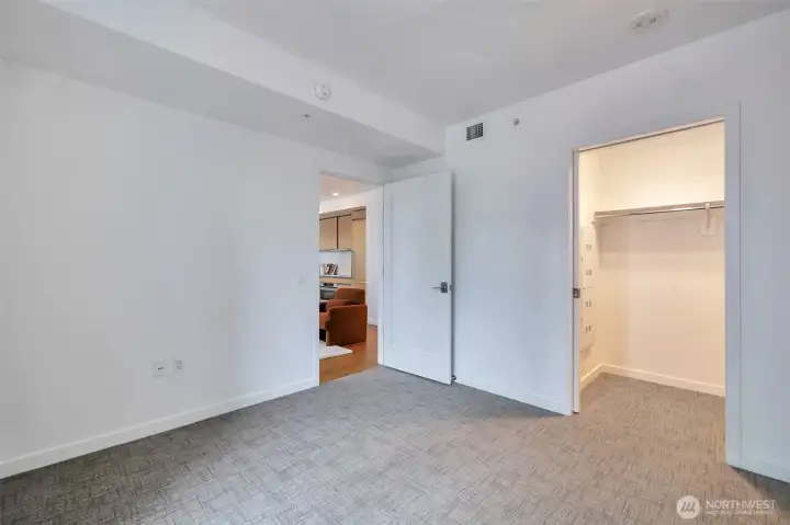 2nd bedroom with a walk-in closet