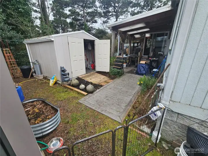 The medium sized shed for your gardening tools.
