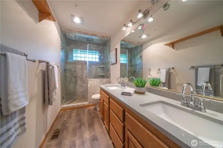 Main floor guest 3/4 bathroom...across from the den/4th bedroom.  Makes having guests easy on the main floor.