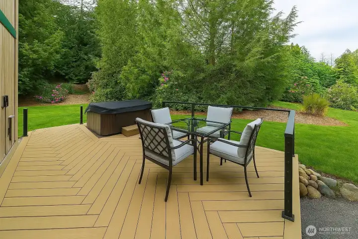 Another view of the entertainment sized deck with built-in hot, tub where you can have a relaxing soak and watch the satellites move across the night sky.