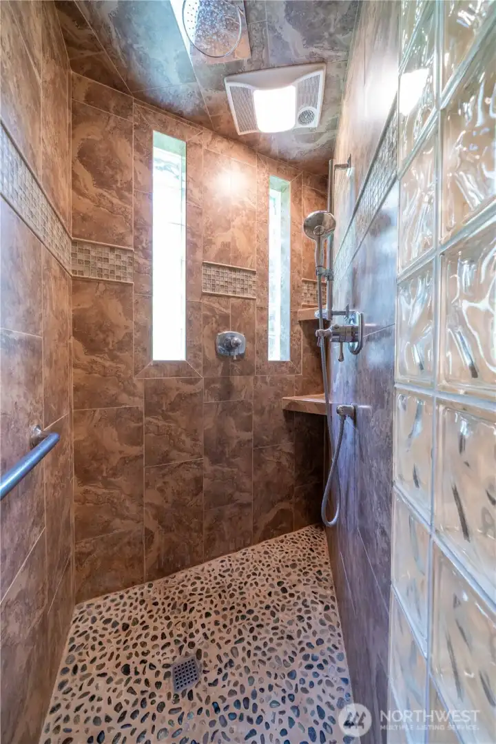 Main floor 3/4 bath across from the den/4th bedroom.