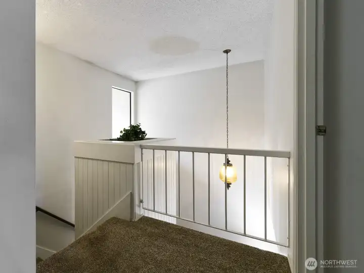 Balcony over the living area. Newer carpet.