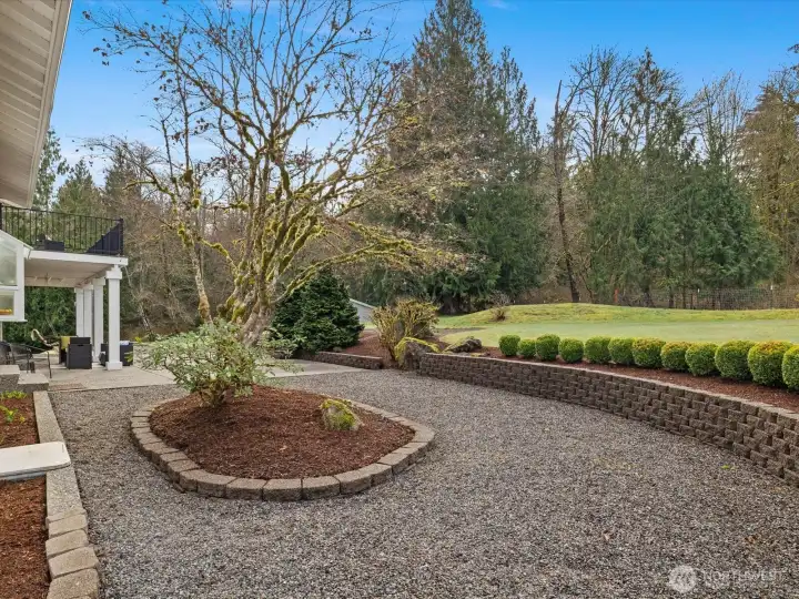 Manicured landscape and outdoor living spaces.
