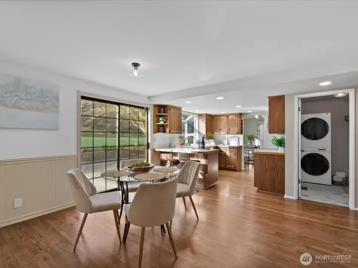 Large laundry room off the kitchen and hall for everyday convenience.