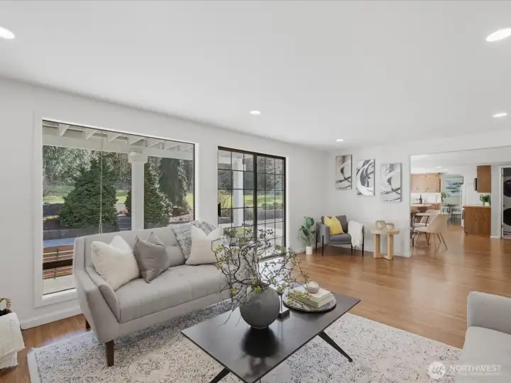 Additional family room off the eat in kitchen with cozy reading nook and an abundance of light.