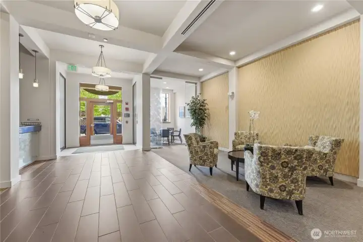 Inviting lobby with a cozy sitting area and natural light - a welcoming spot to meet, relax, or gather