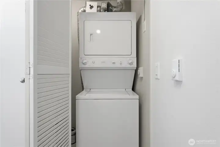The newer, in-unit washer and dryer tucked behind double doors for easy, everyday convenience