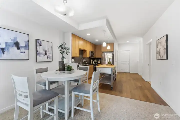 Looking back toward the entry, the open layout and natural light create a warm, welcoming feel throughout the home