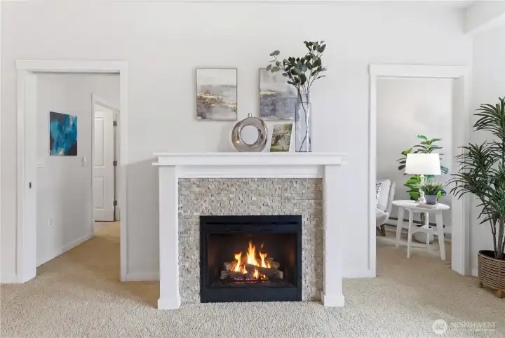 Modern fireplace with a crisp mantel and stylish accents, adding warmth and character to the living space