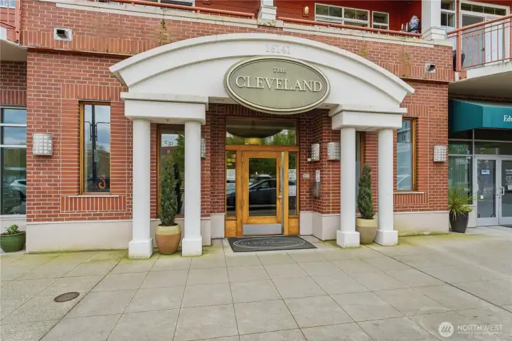 Stately, columned entryway welcoming you into The Cleveland’s secure, well-kept lobby