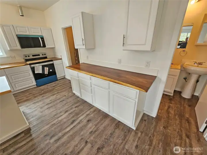 Live edge finished surface thick wood countertops.