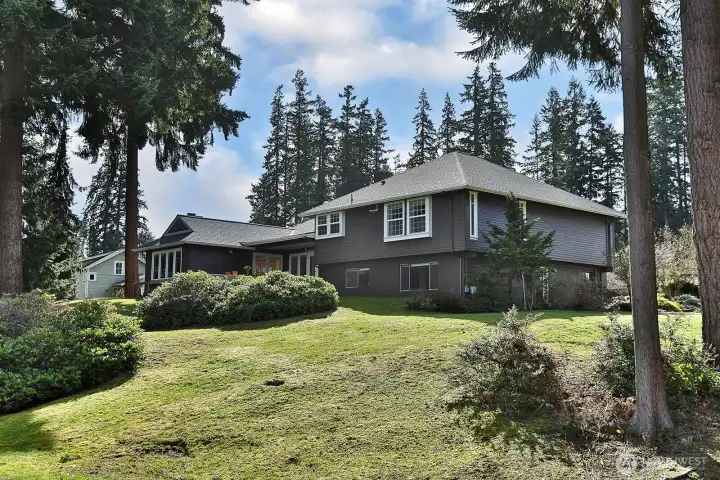 Upper level windows are to the generously sized Primary Suite with views of Saratoga Passage and Camano Island. Lower level windows are to the apartment living area and one of the bedrooms (currently living as an office). Separate entrance to apartment is on the west side of the home. Upper level windows are to the generously sized Primary Suite with views of Saratoga Passage and Camano Island. Lower level windows are to the apartment living area and one of the bedrooms (currently living as an office). Separate entrance to apartment is on the west side of the home.