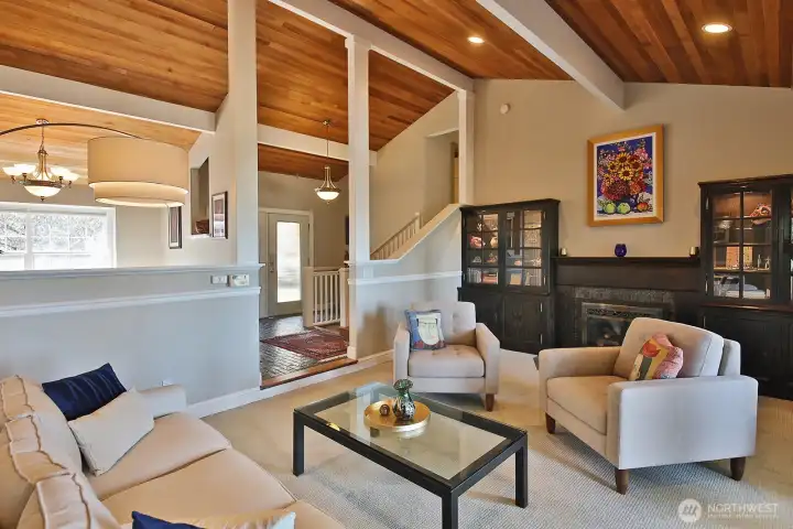 Looking back at the entryway from the Living Room. Vaulted ceilings and propane fireplace. Beyond the right edge of this photo are French doors that lead to your deck. Your back is to the entrance to the Family Room/Wet Bar. Looking back at the entryway from the Living Room. Vaulted ceilings and propane fireplace. Beyond the right edge of this photo are French doors that lead to your deck. Your back is to the entrance to the Family Room/Wet Bar.