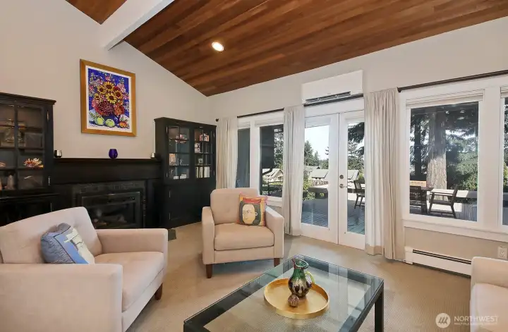 You have views from the Living Room. Note, mini-splits (ductless heat pump) were added in 2018. The home is well suited for entertaining with doors opening to the deck, creating a seamless flow for outdoor/indoor living. You have views from the Living Room. Note, mini-splits (ductless heat pump) were added in 2018. The home is well suited for entertaining with doors opening to the deck, creating a seamless flow for outdoor/indoor living.