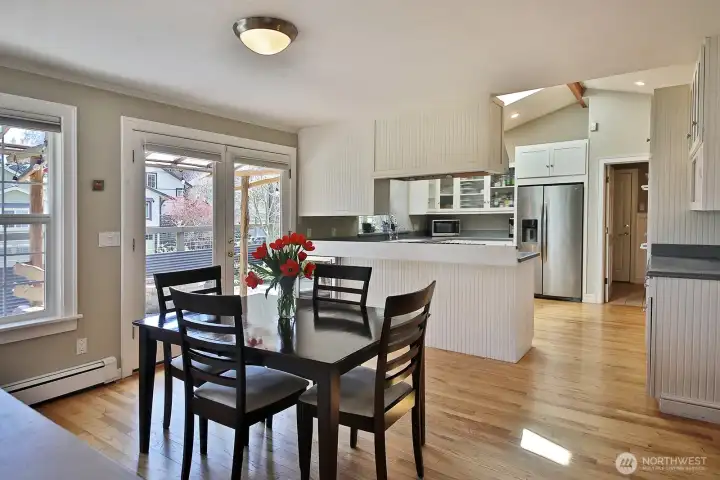 Photographer's back is to the family room. French doors to the left lead to the fenced patio entry, open door in the distance is to the mudroom, wet bar and doorway to the living room is just beyond the right edge of this photo. Photographer's back is to the family room. French doors to the left lead to the fenced patio entry, open door in the distance is to the mudroom, wet bar and doorway to the living room is just beyond the right edge of this photo.