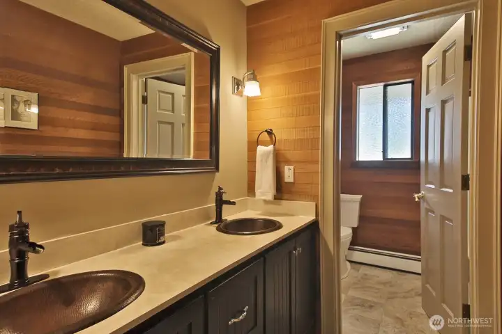Full bath with tub and toilet through the opened door. The access to your walk-in attic and walk-in linen closet is across the hallway from here. Full bath with tub and toilet through the opened door. The access to your walk-in attic and walk-in linen closet is across the hallway from here.