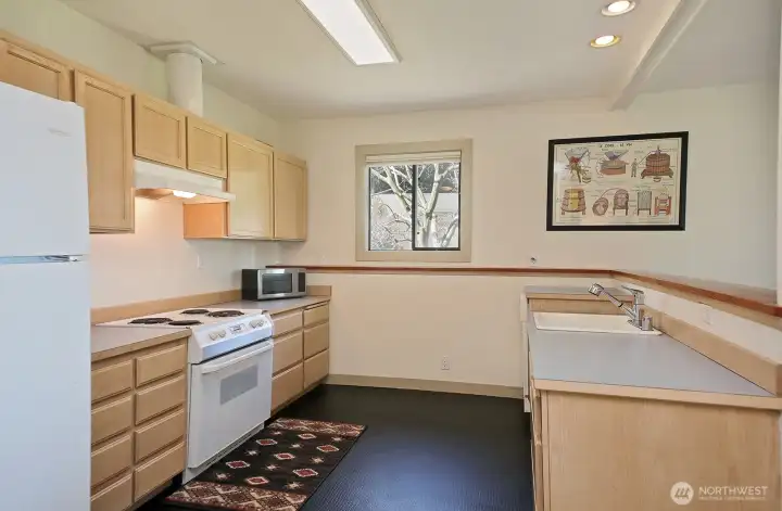 Apartment kitchen, initially designed for wheel chair accessibility. How convenient to have a separate space for guests! Apartment kitchen, initially designed for wheel chair accessibility. How convenient to have a separate space for guests!
