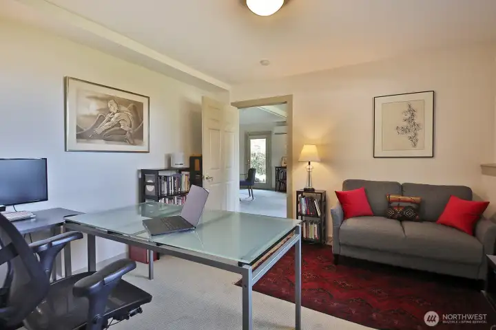 Looking back into the main living area of the apartment. One of the best features of this home is the layout of the floor plan. Let's go check out the other room that is adjacent to this one.... Looking back into the main living area of the apartment. One of the best features of this home is the layout of the floor plan. Let's go check out the other room that is adjacent to this one....